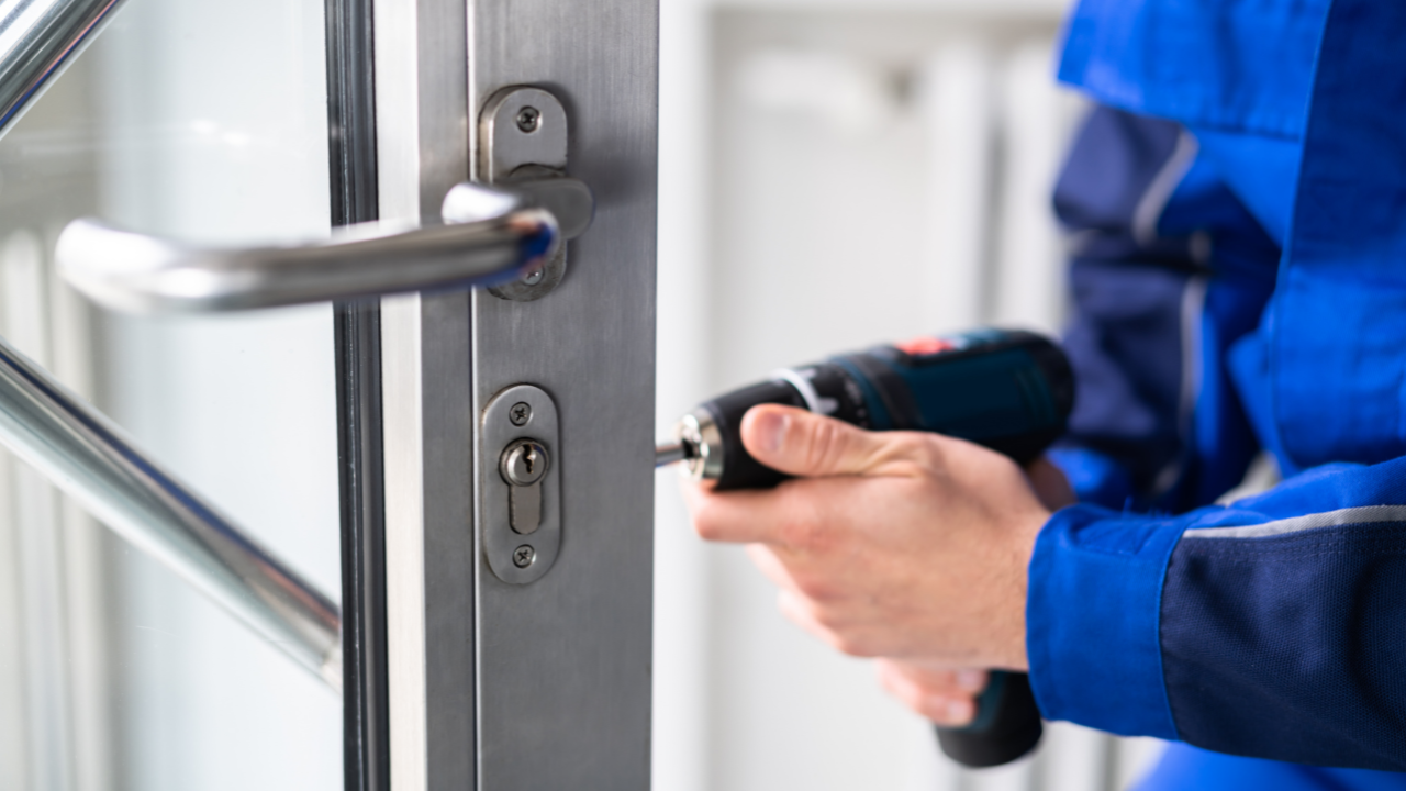 locksmith fitting a new lock